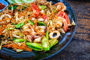 Seafood pad Thai dish with shrimp in Thailand