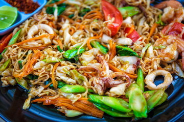 Seafood pad Thai dish with shrimp in Thailand