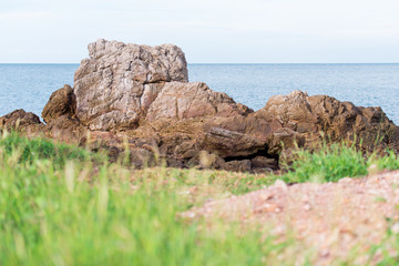 Big rocks, stones in front of the sea