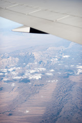 under wing, the clouds, view from window