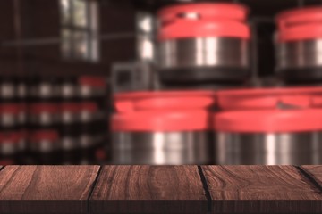 Composite image of wooden desk