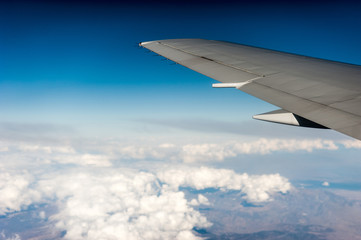 under wing, the clouds, view from window