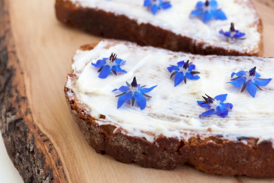 Bread, cheese and borage flowers