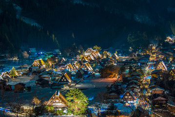 Fototapeta premium Snow falling at light Up Festival shirakawago in winter, japan.