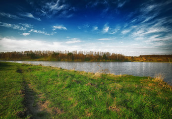 Sunny day on a calm river in summer