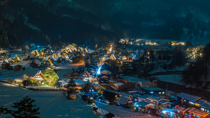Fototapeta premium Snow falling at light Up Festival shirakawago in winter, japan.