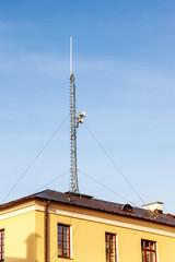 Metal pole with antenna for radio communications.