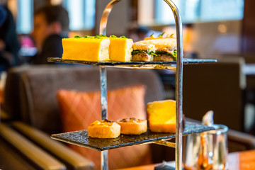 Beautiful English Afternoon Breakfast Ceremony with Desserts and Snacks in Hong Kong Restaurant.