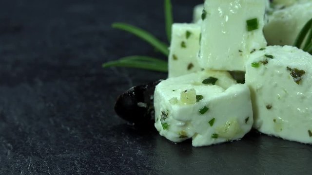Portion of Feta Cheese (rotating 4K footage; seamless loopable)