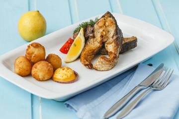 Grilled fish with a garnish