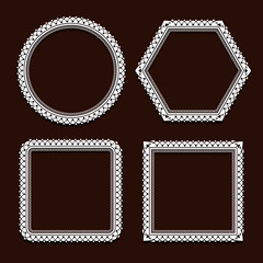 Set of white round frames on brown background