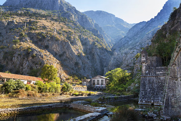 Fototapeta premium Wall of the Kotor old town in sun, Montenegro.