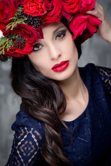 Beautiful woman with roses bunch