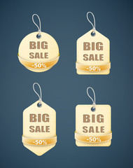 set of big sale paper labels with yellow ribbon