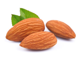 Almonds nuts with leaves close up