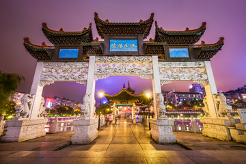 Fototapeta premium The historic gate over the Nanming River in Guiyang, China.