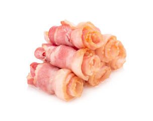 Cooked bacon rashers isolated on white