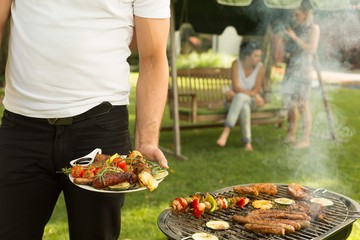 Plate full of grilled food