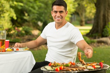 Young man on barbecue party