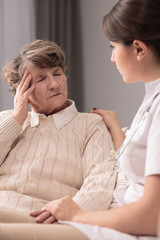 Obraz premium Woman with headache