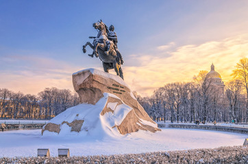 A partial view of Senate Square with the The Bronze Horseman and St.Isaac Cathedral on the background at a frosty winter day - obrazy, fototapety, plakaty