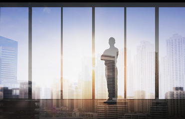 Fototapeta na wymiar silhouette of business man over office background