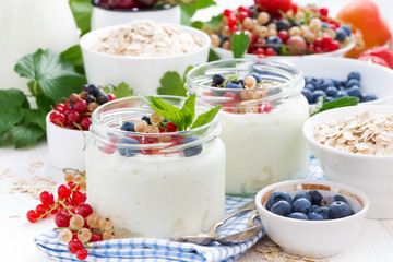 yogurt with fresh berries and breakfast foods