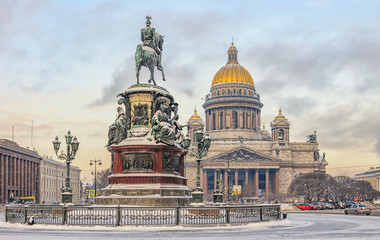 A view of Isaac square with The Monument to Nicholas I and St.Isaac Cathedral at a snowy winter day