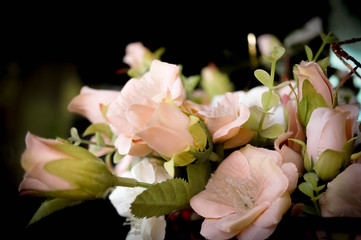 Artificial plants  and flowers with blurred background