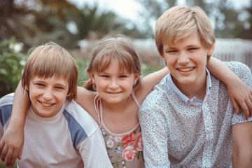 Group Of Children Playing In Park