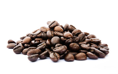 Heap of coffee beans on white background