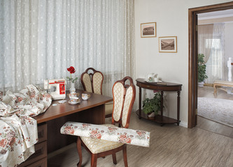 workplace оf seamstress or designer with sewing machine and lux