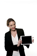 Fototapeta premium Young pretty Caucasian woman displaying a tablet