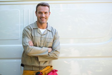 Handyman with tool belt around waist