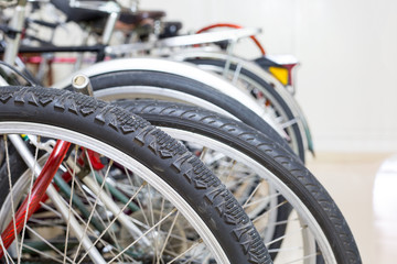 Fototapeta na wymiar Bicycle wheels stop inside home
