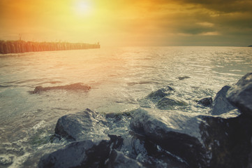 The breakwater in the ocean.