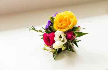 close-up of  Gentle groom's boutonniere 