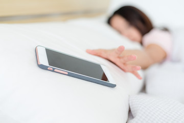 Woman addicted to mobile phone