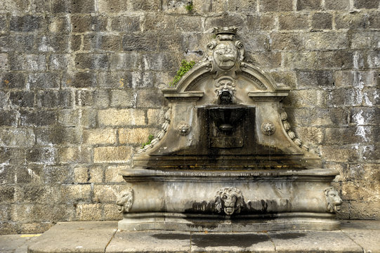 old fountain in the village civita