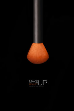 Makeup concept. Professional make-up brush isolated on black