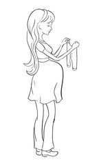 Pregnant woman buying clothes for the unborn child.