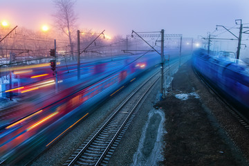 movement of trains in the ways of evening twilight fog Spring