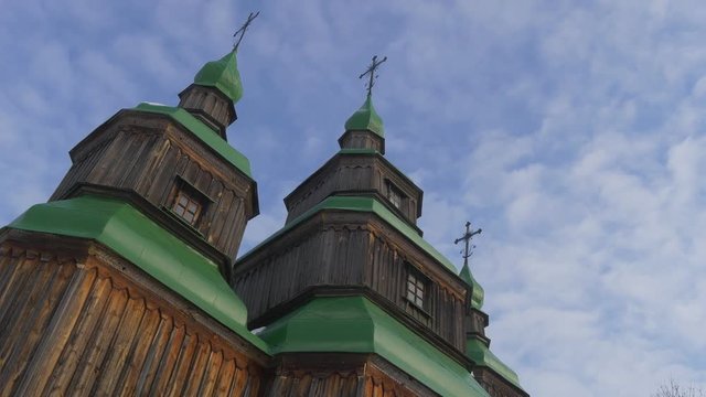 Wooden Church Green Roofs on a Bell Towers Winter Blue Sky Church of Paraskeva the Holy Martyr in Pirogovo Ukrainian Sacral Architecture Baroque Style