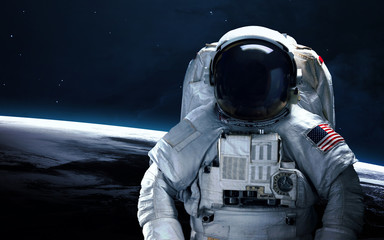 Astronaut in outer space. Spacewalk. Elements of this image furnished by NASA