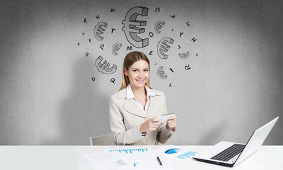 Preparing her financial report