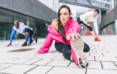 Group of urban runners making sport in an urban area