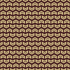 Geometric pattern with golden arrows. Seamless abstract background