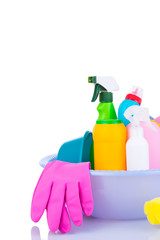 Cleaning kit on white background. Tools for cleaning. Cleaning agents, spray, rubber gloves. Flat Lay