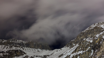 Fototapeta na wymiar Cloudy peaks of Val disere