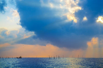 Naklejka premium Fishingman is working in morning